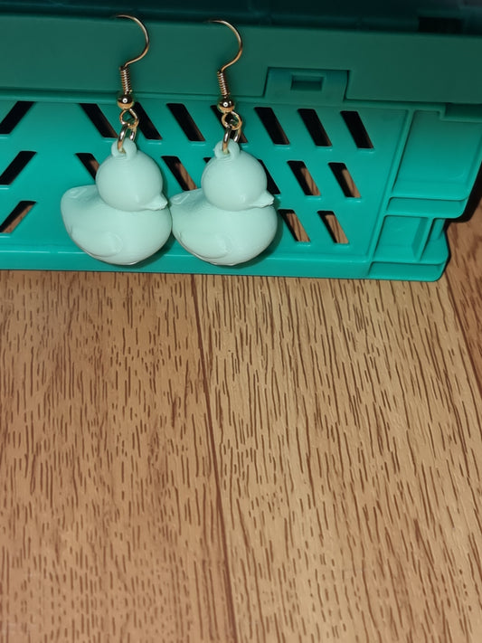 Pair of unique 3D printed duck earrings with intricate details, perfect for adding a whimsical touch.