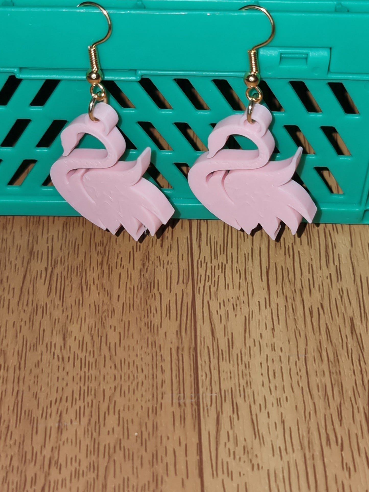 Pair of unique 3D printed swan earrings, perfect for adding a whimsical touch.