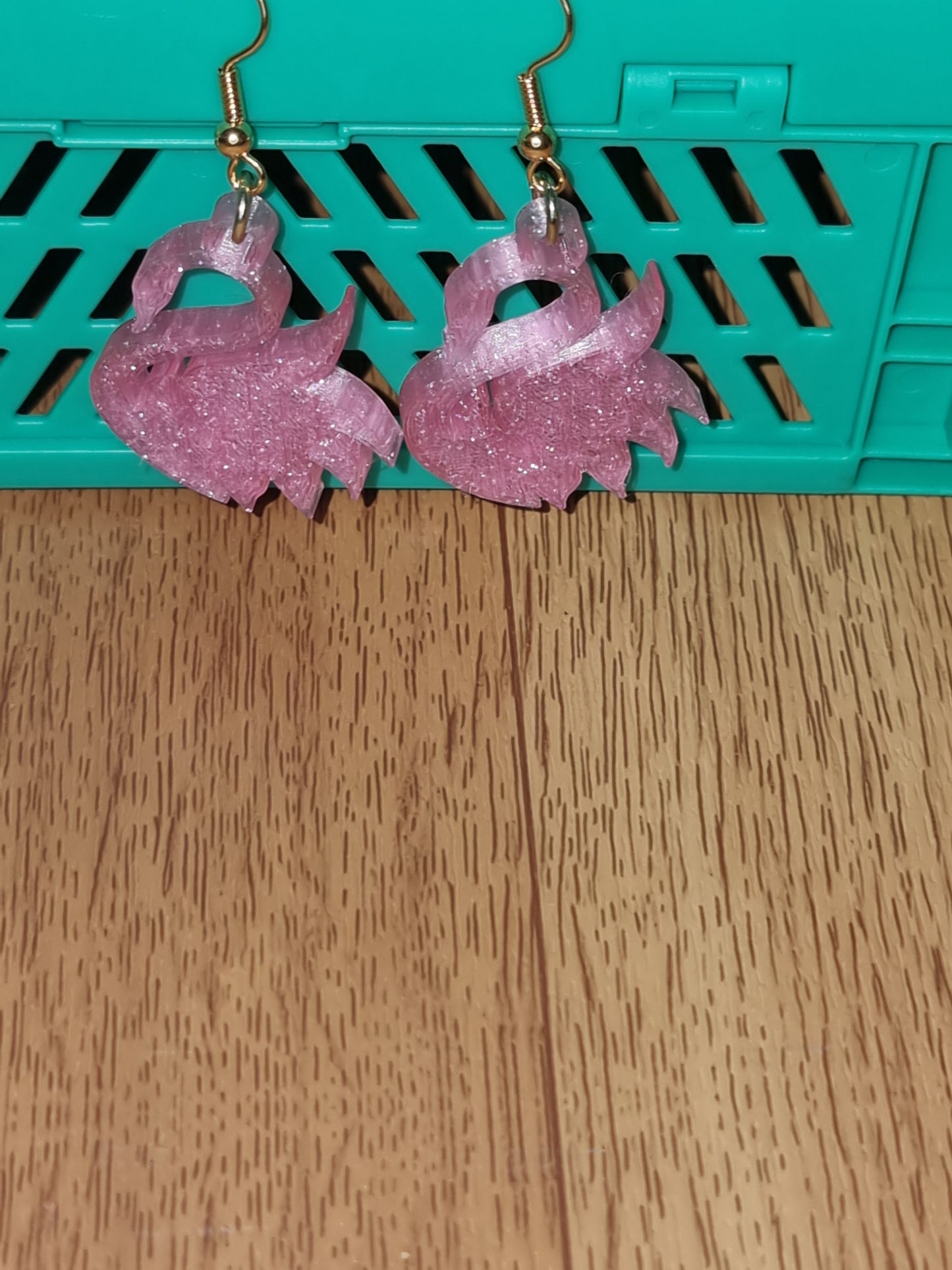 Pair of unique 3D printed swan earrings, perfect for adding a whimsical touch.
