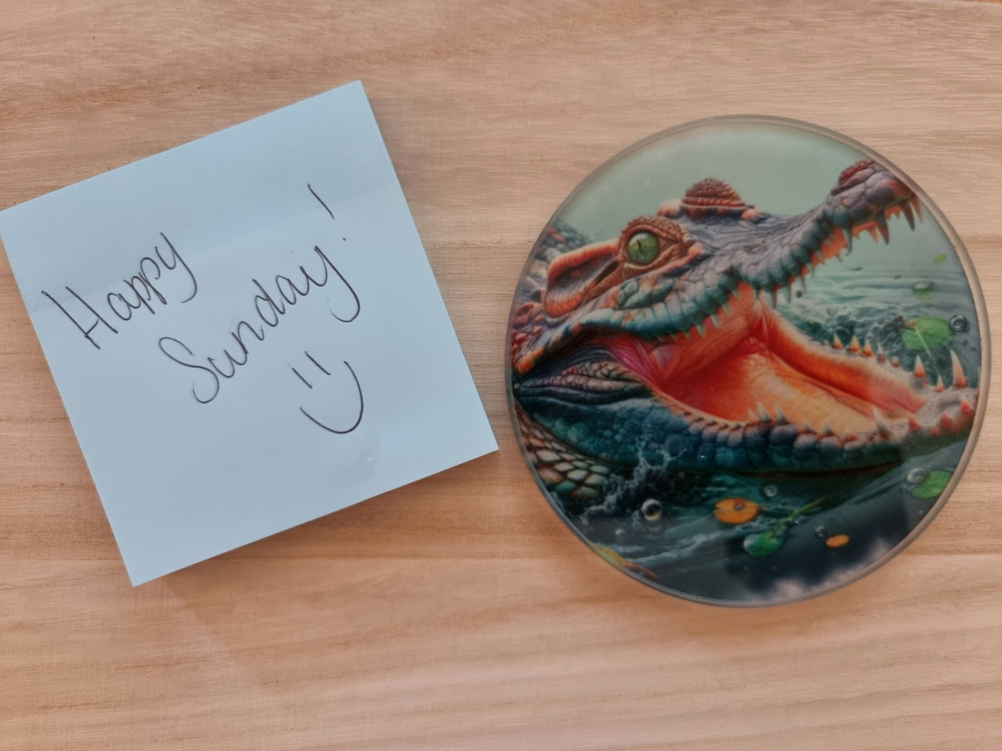 Round glass coaster with a detailed Australian Crocodile sublimation print, protecting surfaces in style.