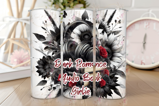 Stainless steel travel tumbler with "Dark Romance Audiobook Girlies" text and headphones with floral accents illustration, perfect for hot or cold drinks.
