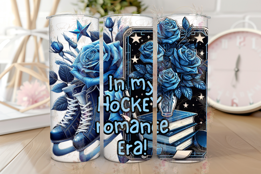 Stainless steel sublimation tumbler with an 'In My Hockey Romance' bookish design, showing ice skates, books, and blue roses, ideal for keeping drinks hot or cold.