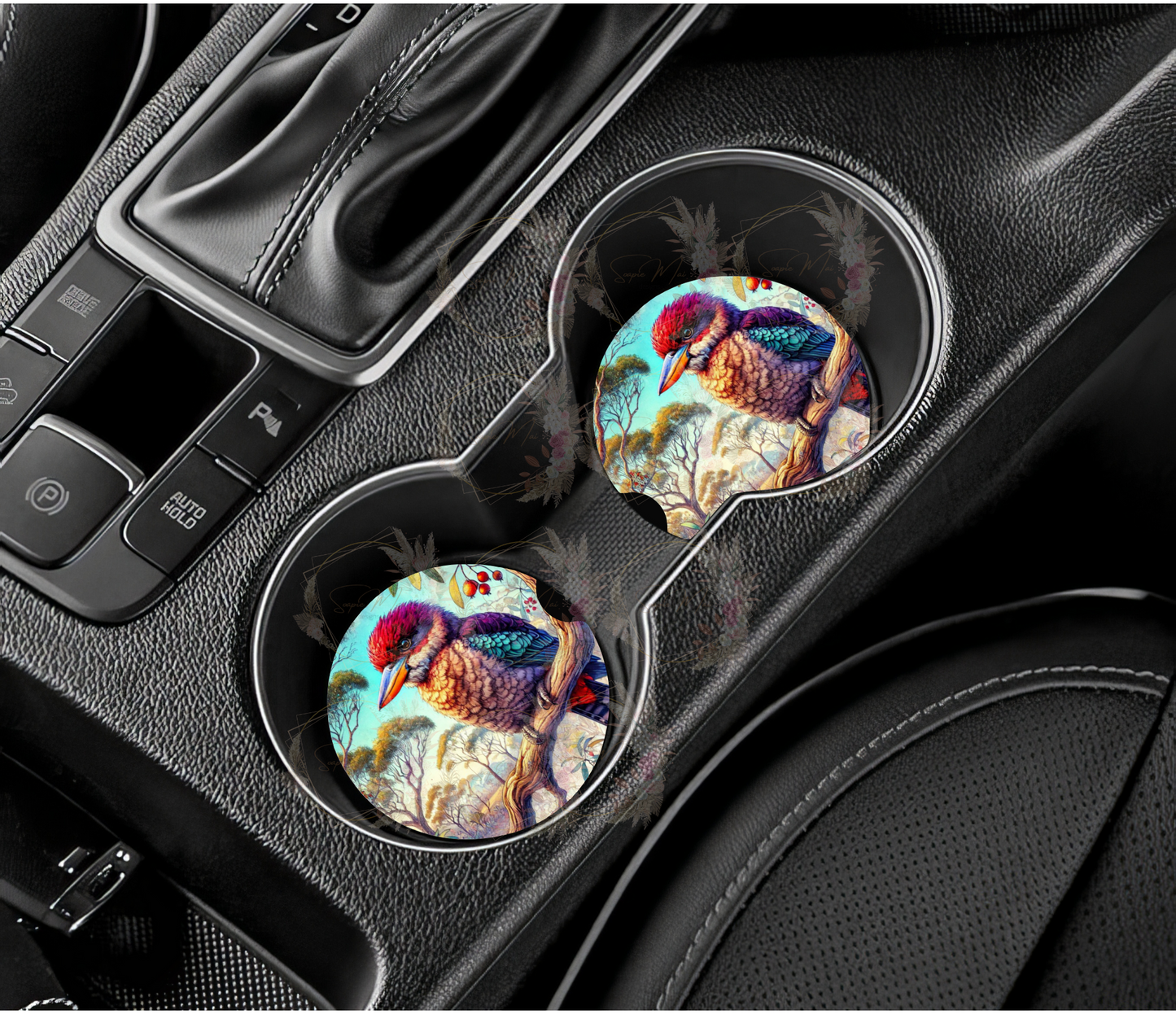 Pair of absorbent car coasters featuring a cheerful Kookaburra in a tree design, protecting your vehicle's cup holders.