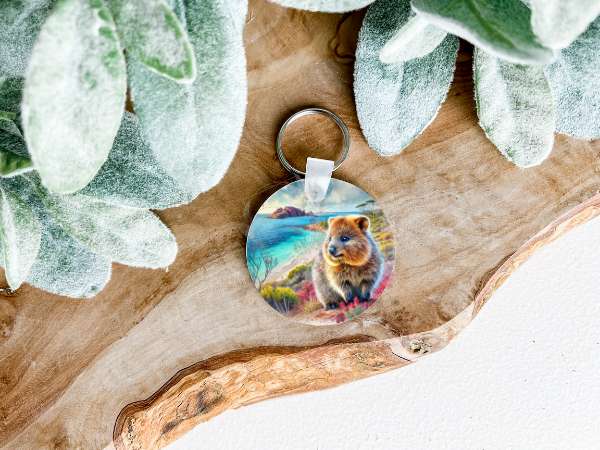Lightweight double-sided MDF keyring featuring a Quokka with Rottnest Island background on both sides, a charming personal accessory.
