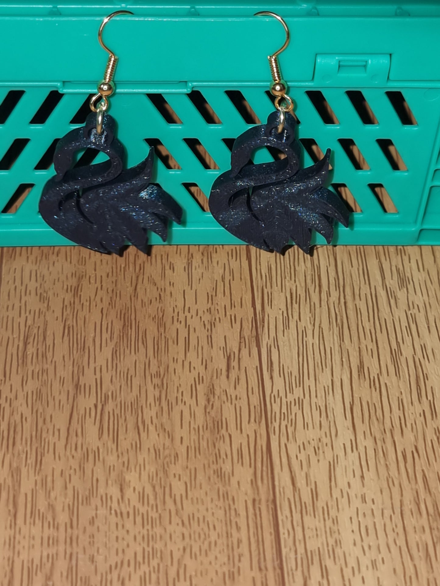 Pair of unique 3D printed swan earrings, perfect for adding a whimsical touch.
