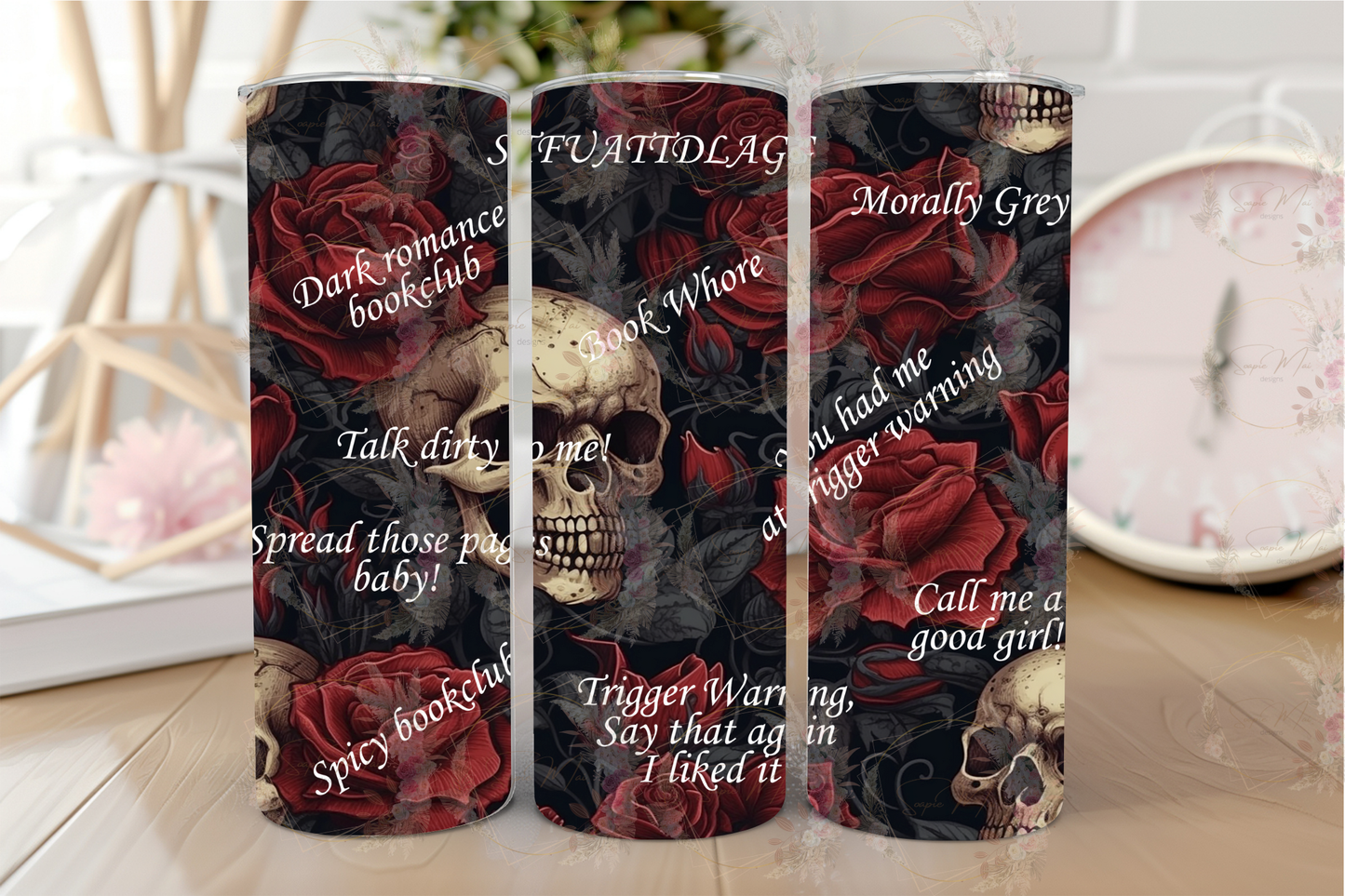 Stainless steel travel tumbler with "Dark Romance" text and skull and roses, perfect for hot or cold drinks.