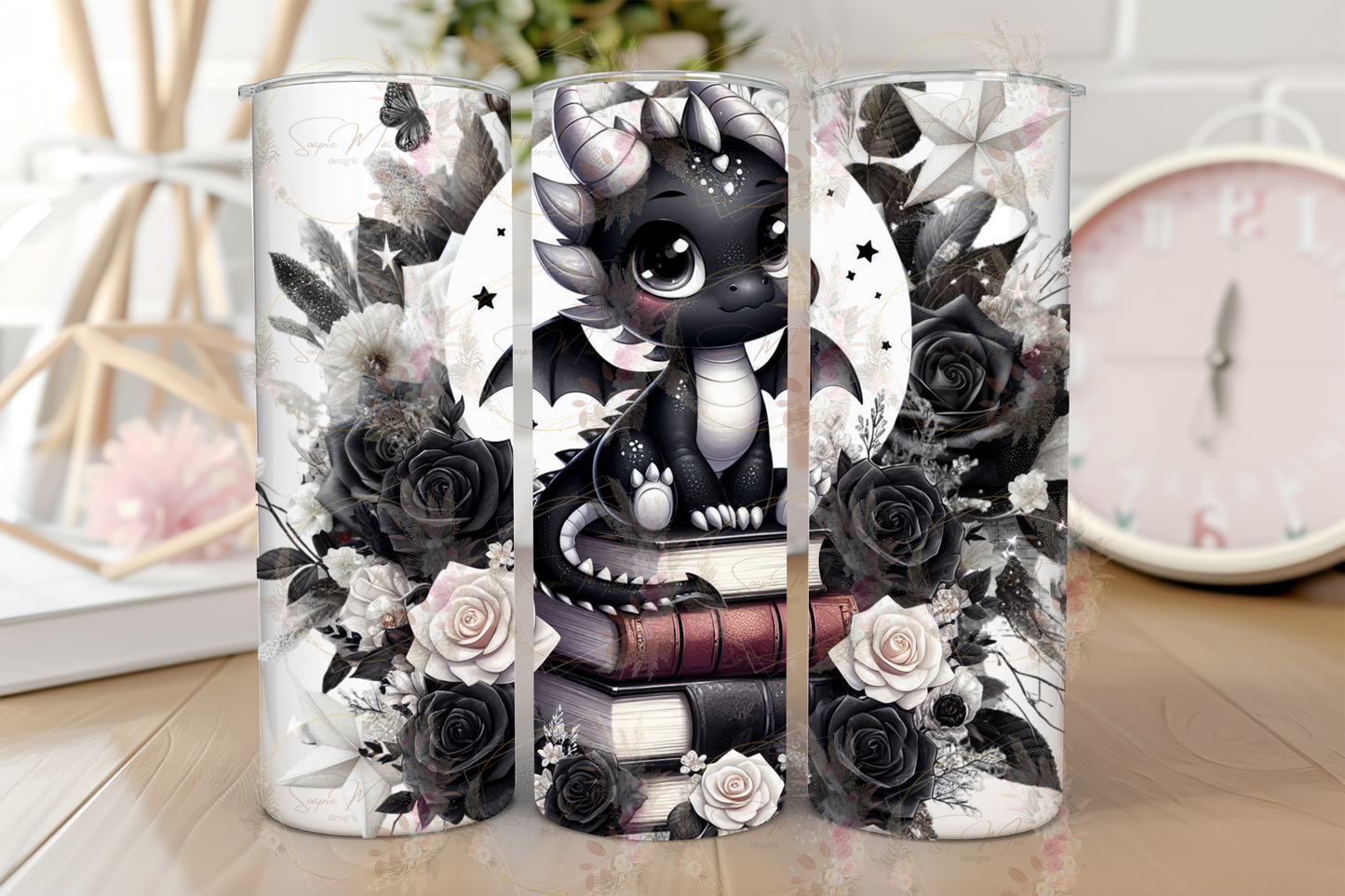 Stainless steel sublimation tumbler with a stunning black and white design of a dragon on a book stack, accented by a moon and flowers, ideal for keeping drinks hot or cold