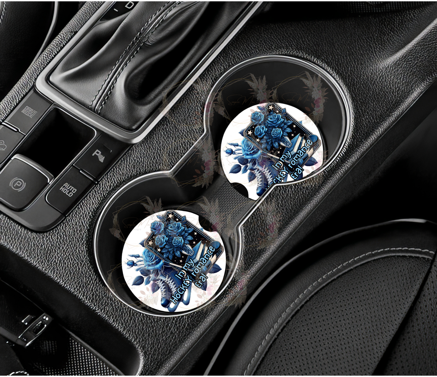 Pair of absorbent car coasters with an 'In My Hockey Romance' bookish design, featuring ice skates, books, and blue roses, protecting your vehicle's cup holders.